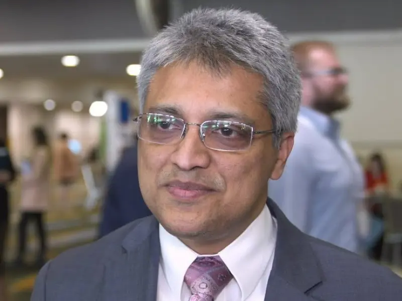 How might the MASS score aid treatment decisions for newly diagnosed patients?